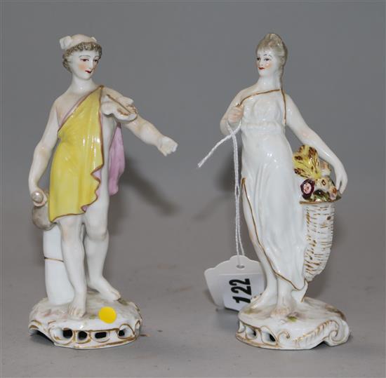 A pair of German porcelain figures of a lady and a youth 5.5in.